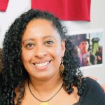 cdn-storyteller_viviana-medina Viviana and Leah at the Immigrant Workers Centre in front of the Fight for $15 minimum wage campaign.
Photo Credit: Phyllis Lewis