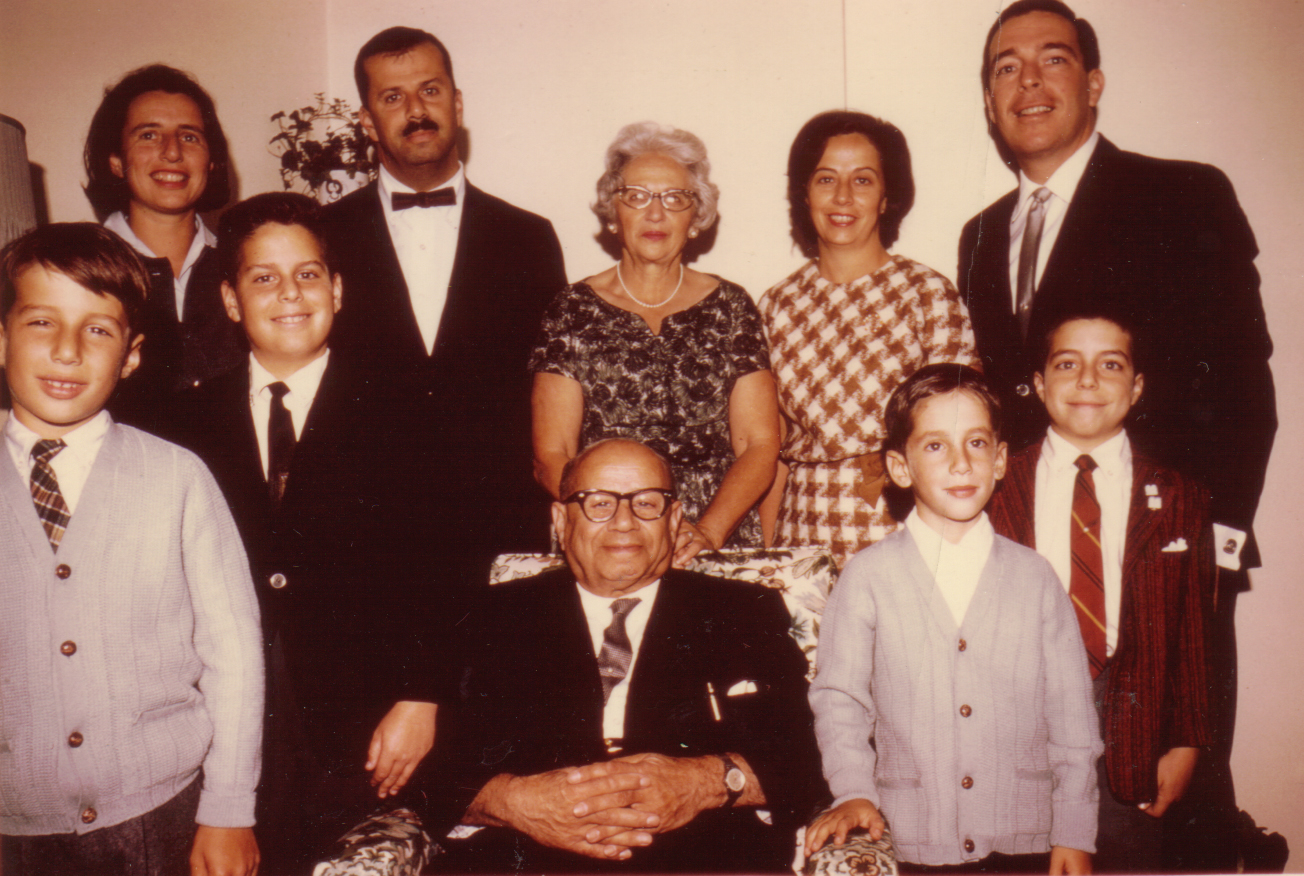 Family photograph, ~1966. Accessed from Andrew Sprachman. Mandel (second from left in the back); Abraham (centre); Robert (right of Abraham). Family photograph, ~1966. Accessed from Andrew Sprachman. Mandel (second from left in the back); Abraham (centre); Robert (right of Abraham).