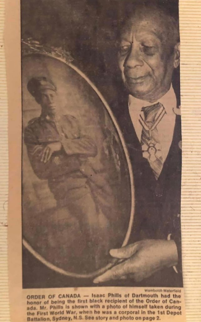 Isaac Phills with Order of Canada medal, looking at his First World War portrait, n.d., newspaper clipping, courtesy of Kathy Grant. Isaac Phills with Order of Canada medal, looking at his First World War portrait, n.d., newspaper clipping, courtesy of Kathy Grant.